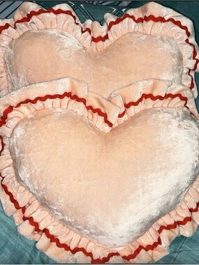 Plush Heart Throw Pillow in Peach with Red Trim
